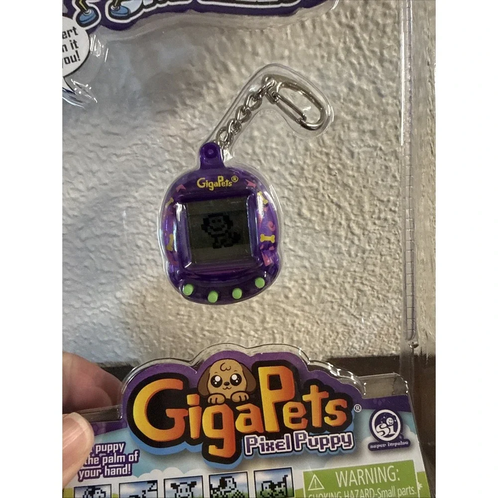 Worlds Smallest GigaPets Virtual Pet Pixel Puppy Giga Pet Electronic Purple Dog